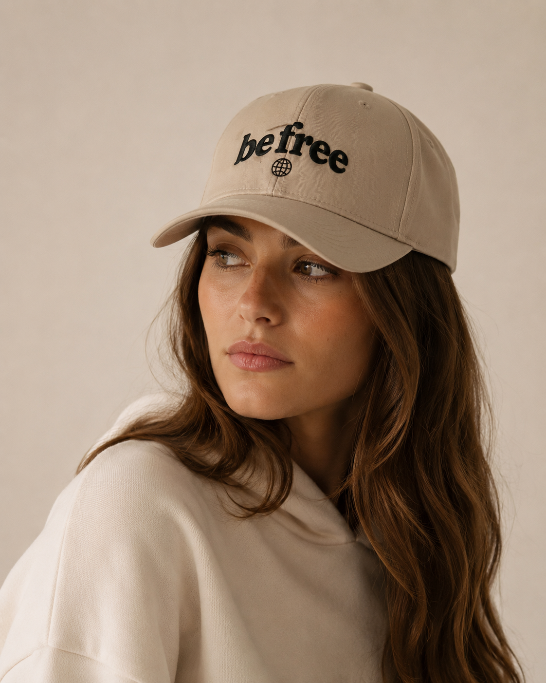 BE FREE Oversized Tee Black Globe - woman wearing black oversized tee with BE FREE globe back print